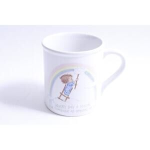 Betsey Clark, Child Drawing a Rainbow, Message Mug, Every Day Is Special, 1969,